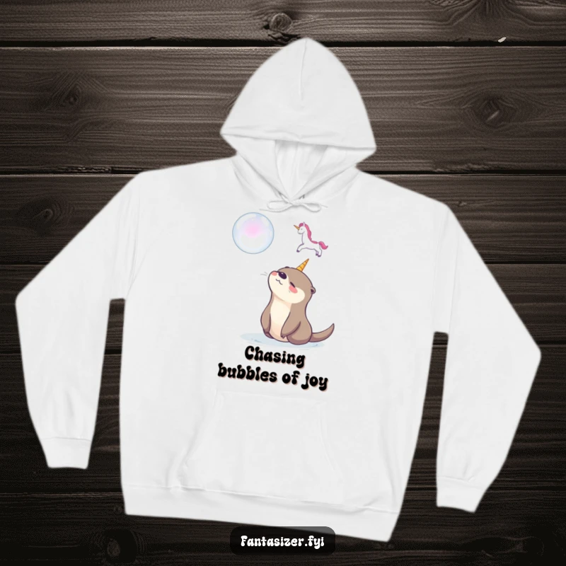 Funny hoodie with a happy otter mesmerized by a soap bubble unicorn, offering cozy warmth and a touch of dreamy, whimsical fun.